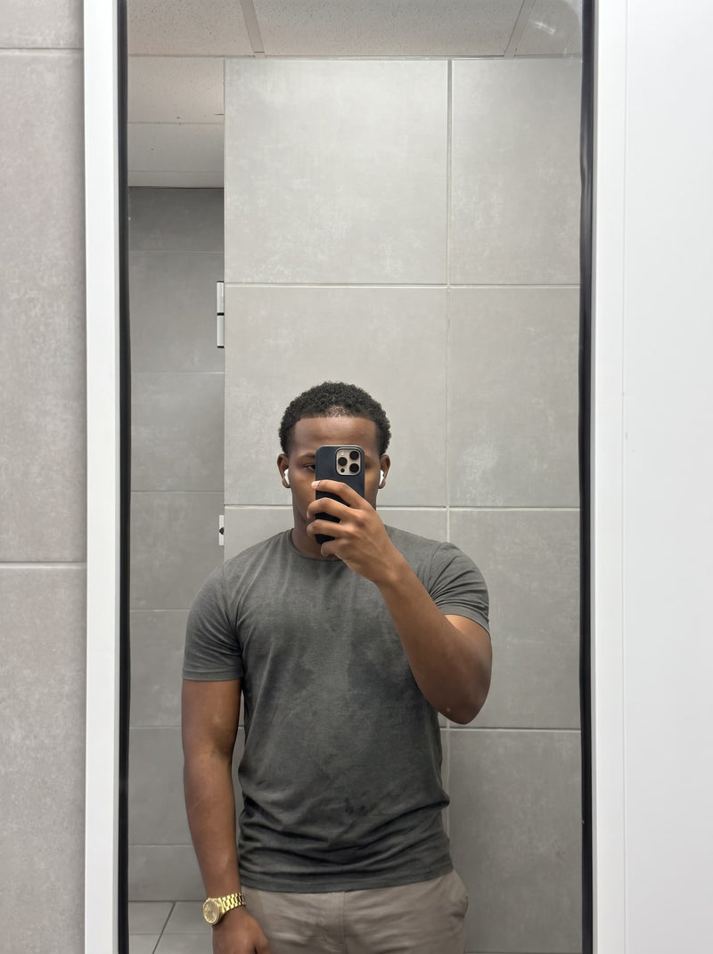 PrimeCut customer wearing the grey tee